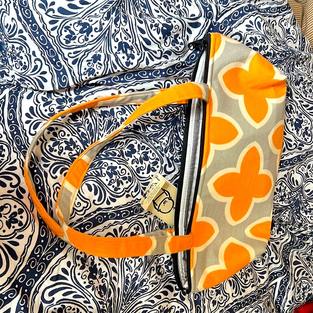 15” L x 7” H/brand new. Use as purse or to carry wine bottle. Two 8” L handles